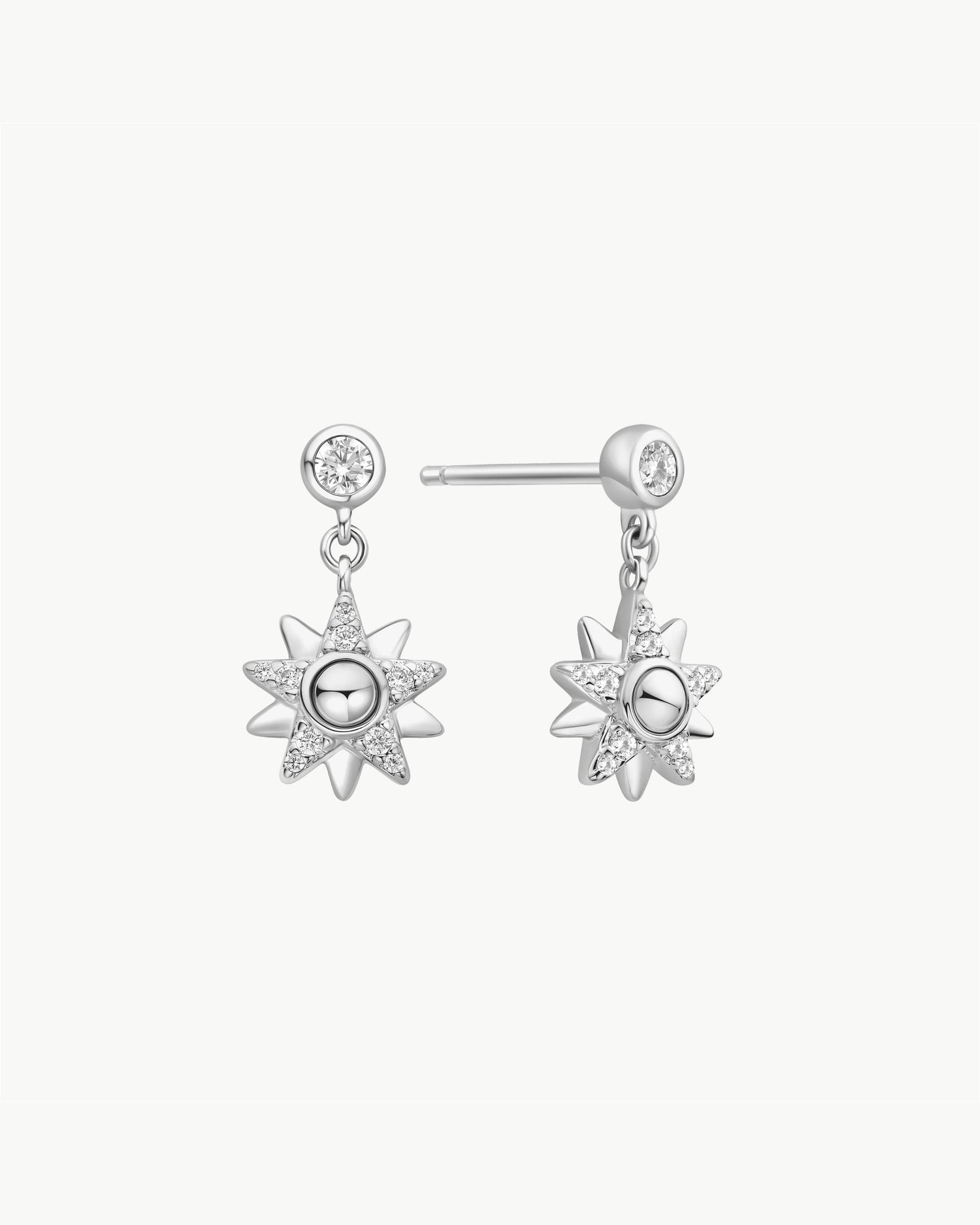 Starlit Drops Silver Sunburst Dangle Stud Earrings