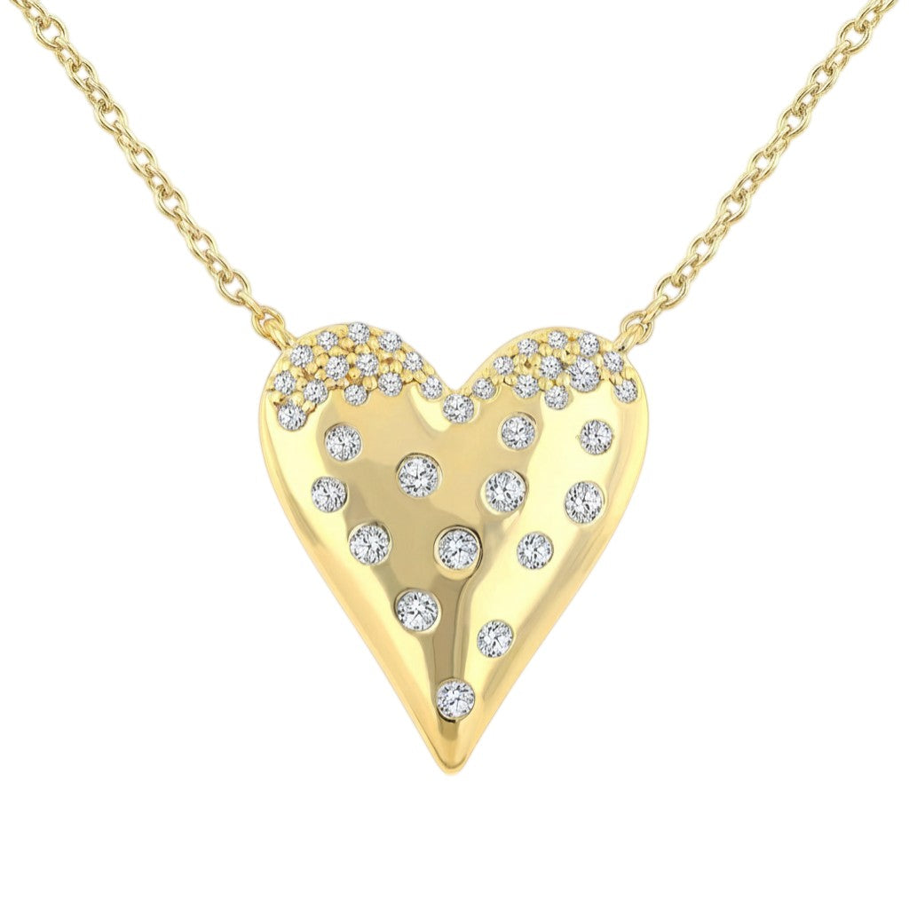 Selman's Jewelers 10K yellow gold heart pendant necklace with round cut diamonds.