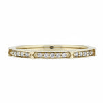 Selman's Jewelers 14k yellow gold band with 15 round diamonds, 0.08ctw. Size 7.