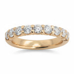 Selman's Jewelers 14k white gold 0.64ctw straight diamond wedding band with sparkling round-cut diamonds.