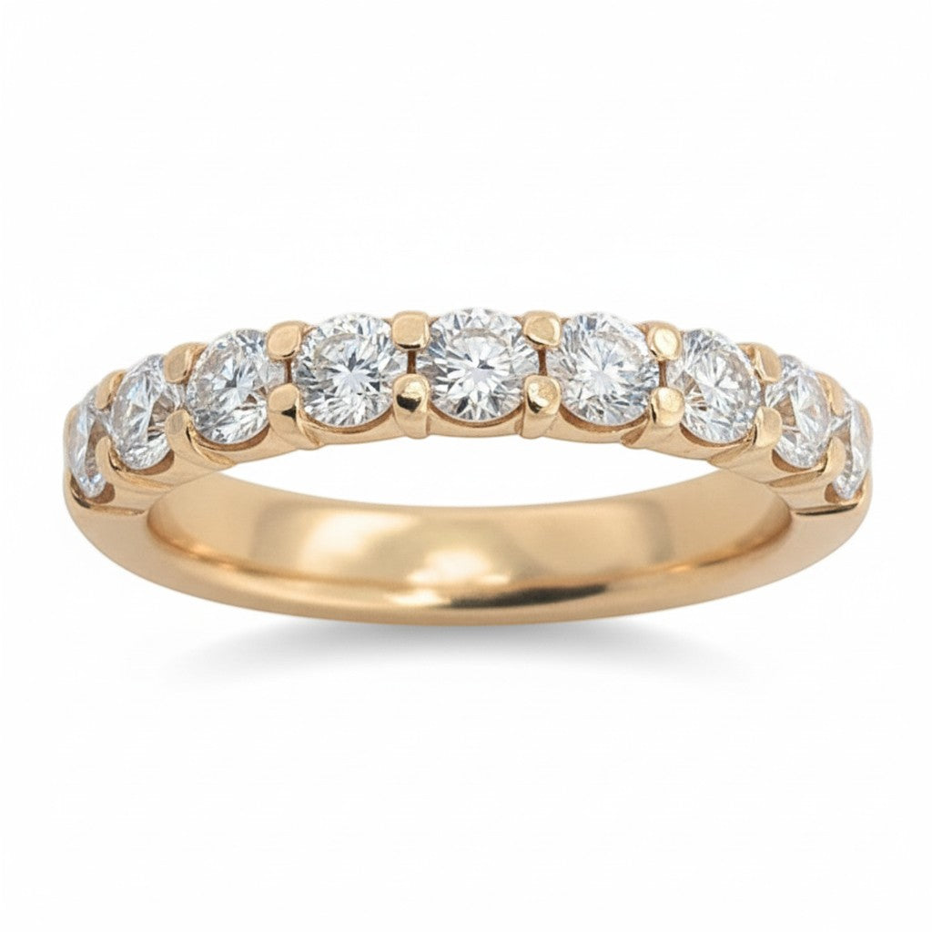 Selman's Jewelers 14k white gold 0.64ctw straight diamond wedding band with sparkling round-cut diamonds.