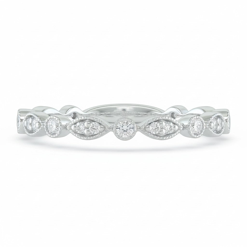 Selman's Jewelers 14k white gold wedding band with 0.18ctw marquise and round diamonds.
