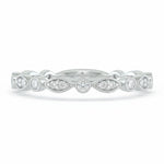 Selman's Jewelers 14k white gold wedding band with 0.18ctw marquise and round diamonds.