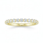 Selman's Jewelers 14k yellow gold shared prong diamond wedding band with 0.34ctw diamonds.