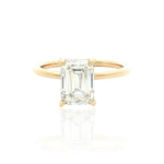 Selman's Jewelers 14k yellow gold engagement ring with a 2.13ct emerald cut lab grown diamond and hidden halo.