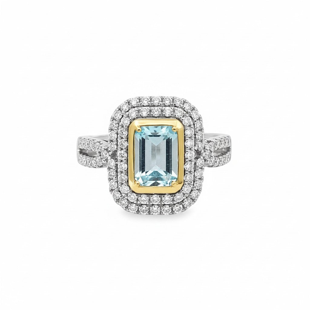Selman's Jewelers 14k white and yellow gold ring with emerald-cut aquamarine and diamond halo.
