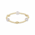 Selman's Jewelers 14k gold filled bracelet with pearls and cross charms.