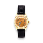 Selman's Jewelers 14K gold Rolex Perpetual Bubbleback wristwatch with a brown dial and black alligator strap.