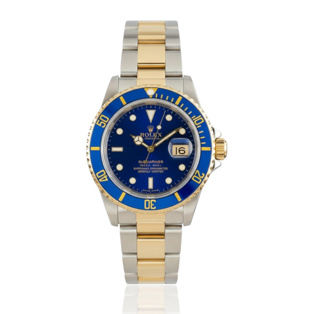 Selman's Jewelers 1997 pre-owned Rolex Submariner watch, stainless steel and 18k yellow gold with blue dial and bezel.